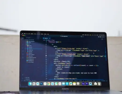 Laptop displaying code outdoors, ideal for remote work or freelance programming.